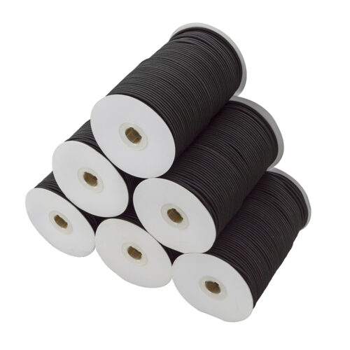 A stack of 6 black elastic cords showcased together.