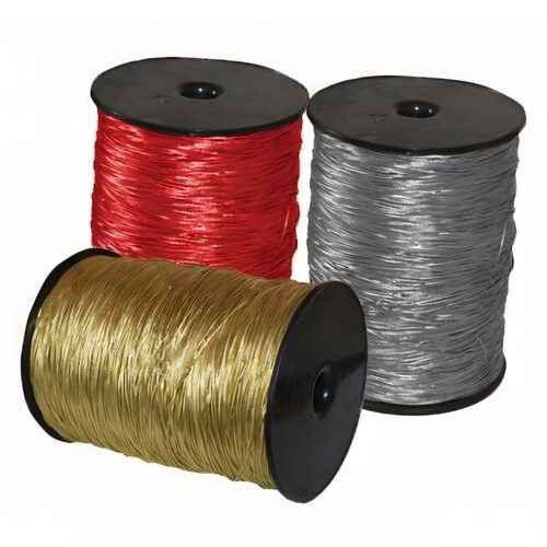 Gold, silver, and red elastic cords in rolls