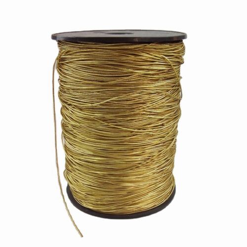 A roll of gold elastic cord