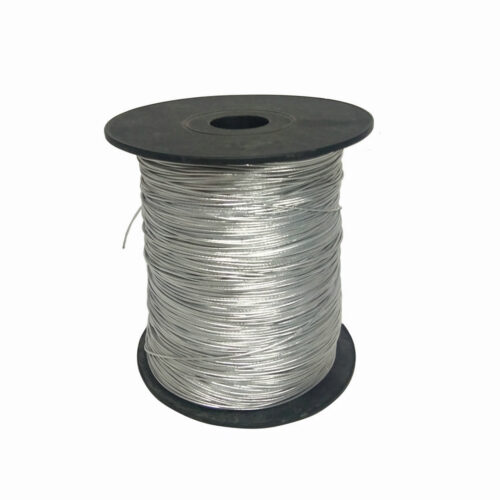 A roll of silver elastic cord
