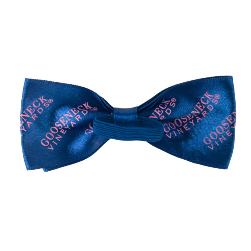Blue bow tie with pink logo, elastic band at the back display