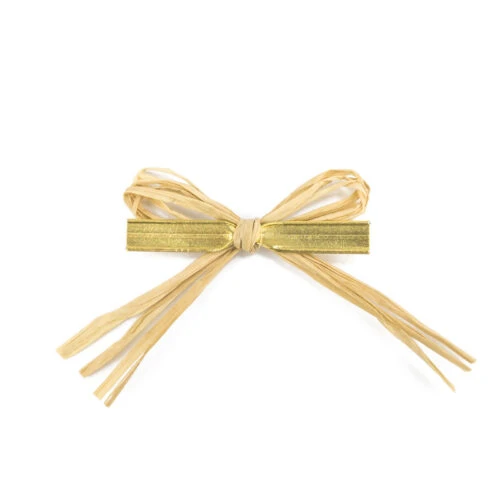 The back of a handmade raffia bow with a double wire tie.