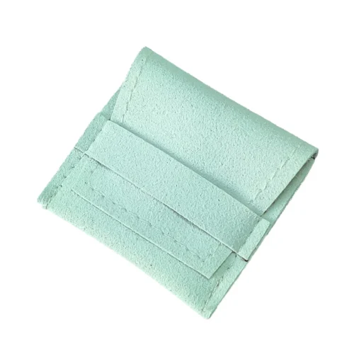Customizable Microfiber Suede Ring Pouch in a light green hue, showcasing the fold-over design.