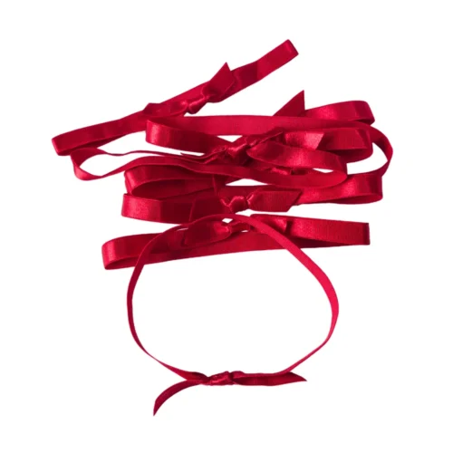 Custom elastic band loop knots in red, showcasing various styles and sizes.