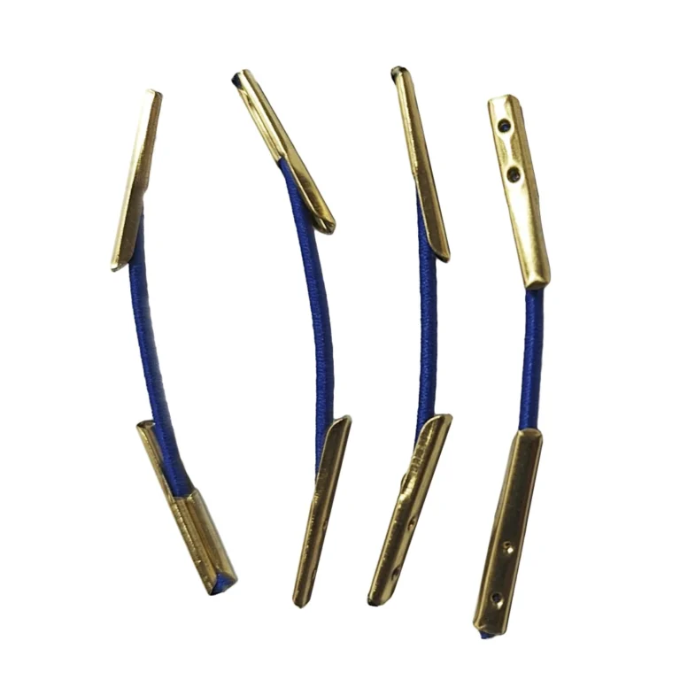Cordon élastique personnalisé avec barbes dorées, présentant différentes couleurs et longueurs.