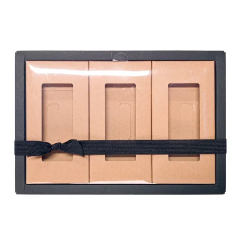 Nœud en ruban élastique tricoté personnalisé présenté sur un emballage de boîte cadeau.