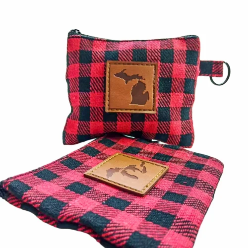 Custom zippered pouches with leather patches, showcasing a unique design and quality craftsmanship suitable for personalization.