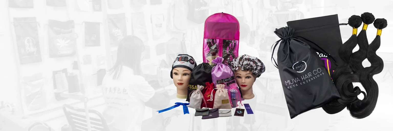 Custom fabric gift bags for wigs and jewelry, displayed in a production workshop setting.