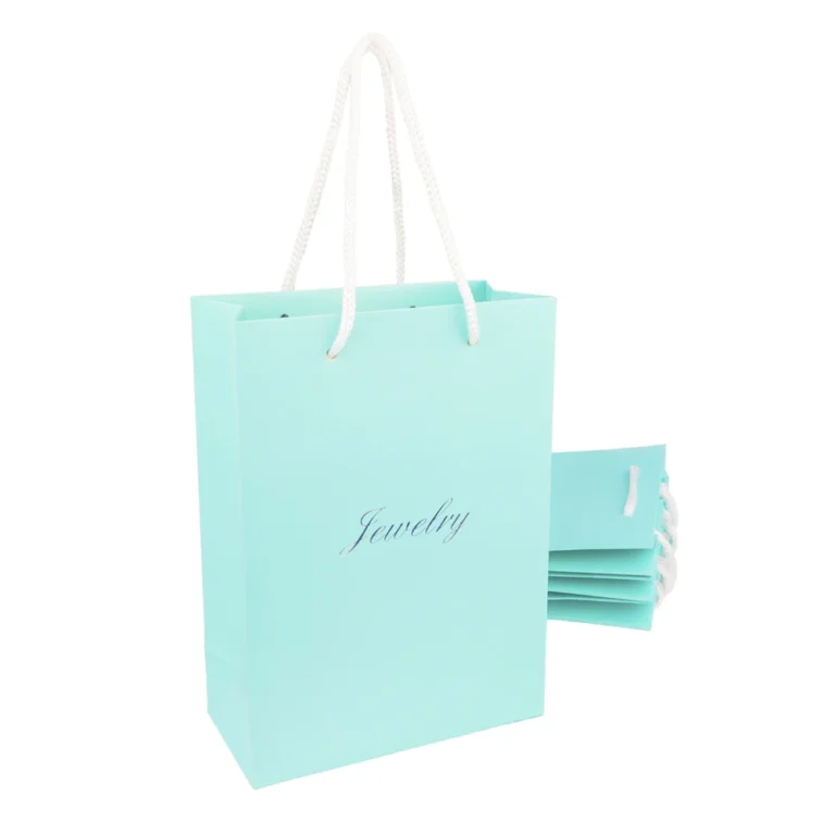Sacs fourre-tout en papier personnalisés de couleur turquoise vibrante, présentant un design élégant idéal pour la marque et la vente au détail.
