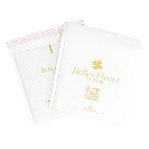 壊れやすい品物の発送用に設計されたカスタム PE パッド入り封筒。内側は気泡緩衝材、外側は滑らかな表面で、ブランド化のオプションを備えています。