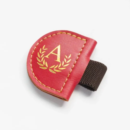 Marque-page rond rouge magnétique en cuir avec porte-stylo élastique (échantillon).