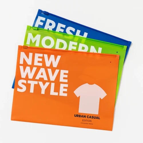 Sample custom printed zipper bag trio in orange, green and blue, PE material with smooth zip slider