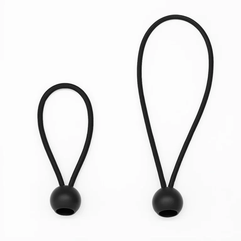 Exemple de boucle élastique personnalisable avec cordon perlé : deux boucles élastiques noires avec perles de différentes tailles.
