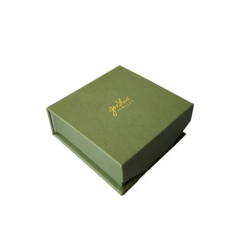Custom olive green magnetic flip top jewelry box with gold foil logo and textured paper finish.