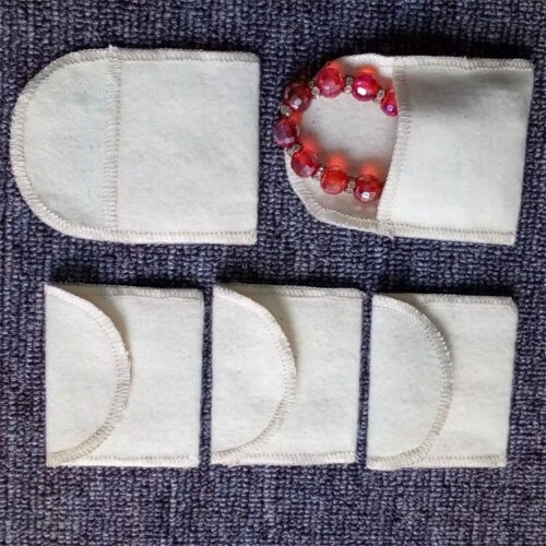 Custom napped envelope pouch made of 100% cotton peach skin for scratch-free jewelry packaging.