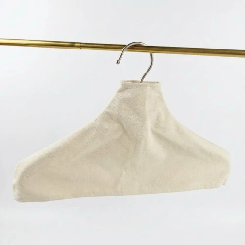 Beige canvas Custom Fabric Hanger Covers shown at a three-quarter angle with shoulder shaping